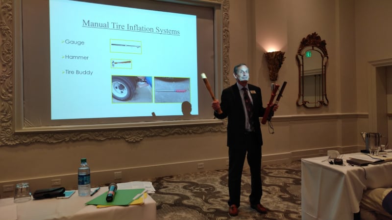 Al Cohn, director of new market development and engineering support for P.S.I., shows some of the “manual” tire inflation checking devices drivers use. Using these devices could be leading to lower fuel economy as they do not accurately measure tire inflation pressure.