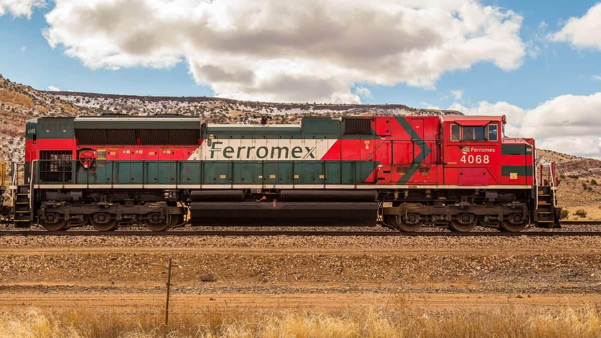 A Ferromex locomotive is painted in the national colors of Mexico.