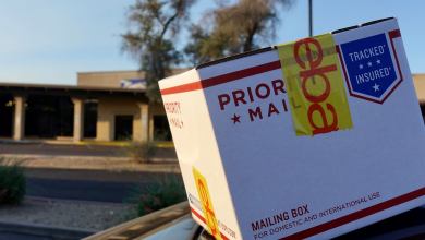 Close up of a Priority Mail box.