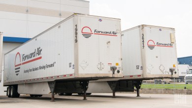 A pair of Forward Air trailers at an airport warehouse