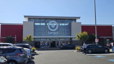 Front view of a Target store from parking lot on a sunny day.