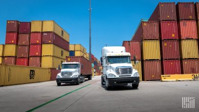 Trucks with containers at a port