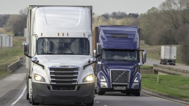 two trucks on the highway