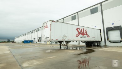 A Saia trailer at a warehouse dock door