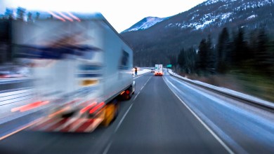 truck on highway with snow
