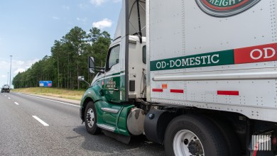 a closeup of an Old Dominion daycab pulling an Old Dominion trailer