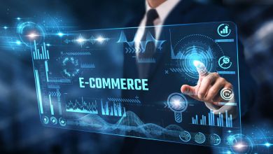 Digital art representing e-commerce technology bits and bytes and computer monitor.