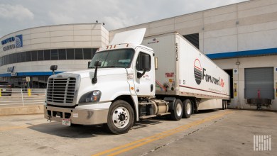A Forward Air trailer backed up to a United Airlines cargo facility