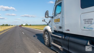 closeup of a JB Hunt dedicated tractor on a highway