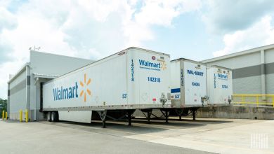 Walmart truck trailers seen at a loading dock.