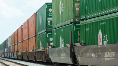 Hub Group intermodal containers on a BNSF wellcar