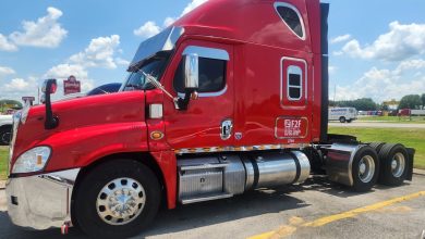 Red F2F Transport semi-truck representing the Chattanooga-based owner-operator carrier acquired by LRT Group.