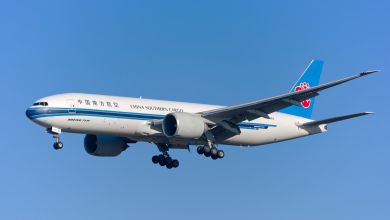 A China Southern Cargo freighter aircraft approaches an airport with wheels down.