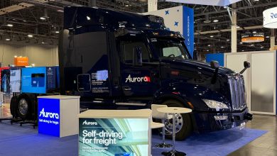 Aurora self-driving Peterbilt Class 8 truck on display promoting autonomous freight hauling